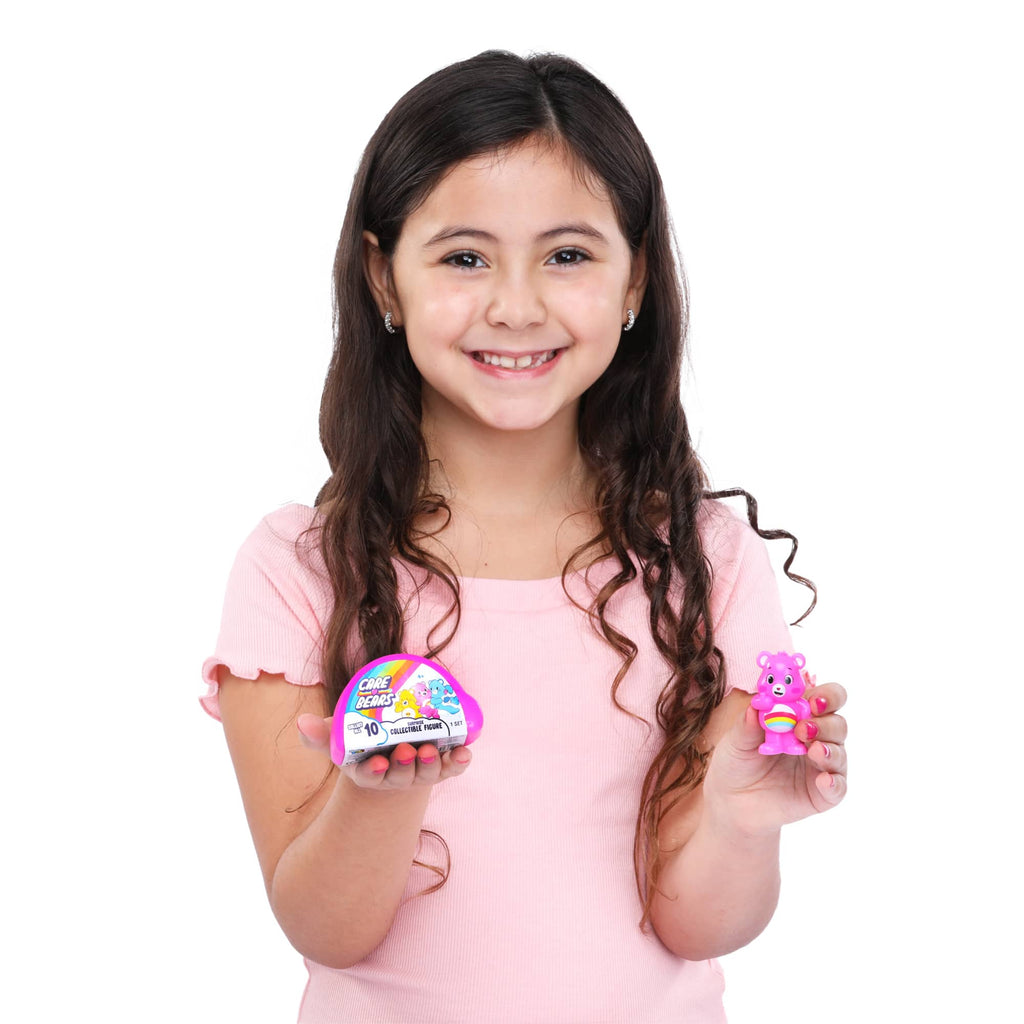 Care Bears surprise figure being held by girl