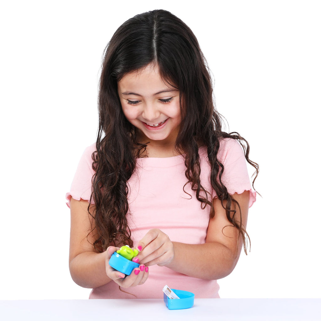 Care Bears surprise figure being held by girl
