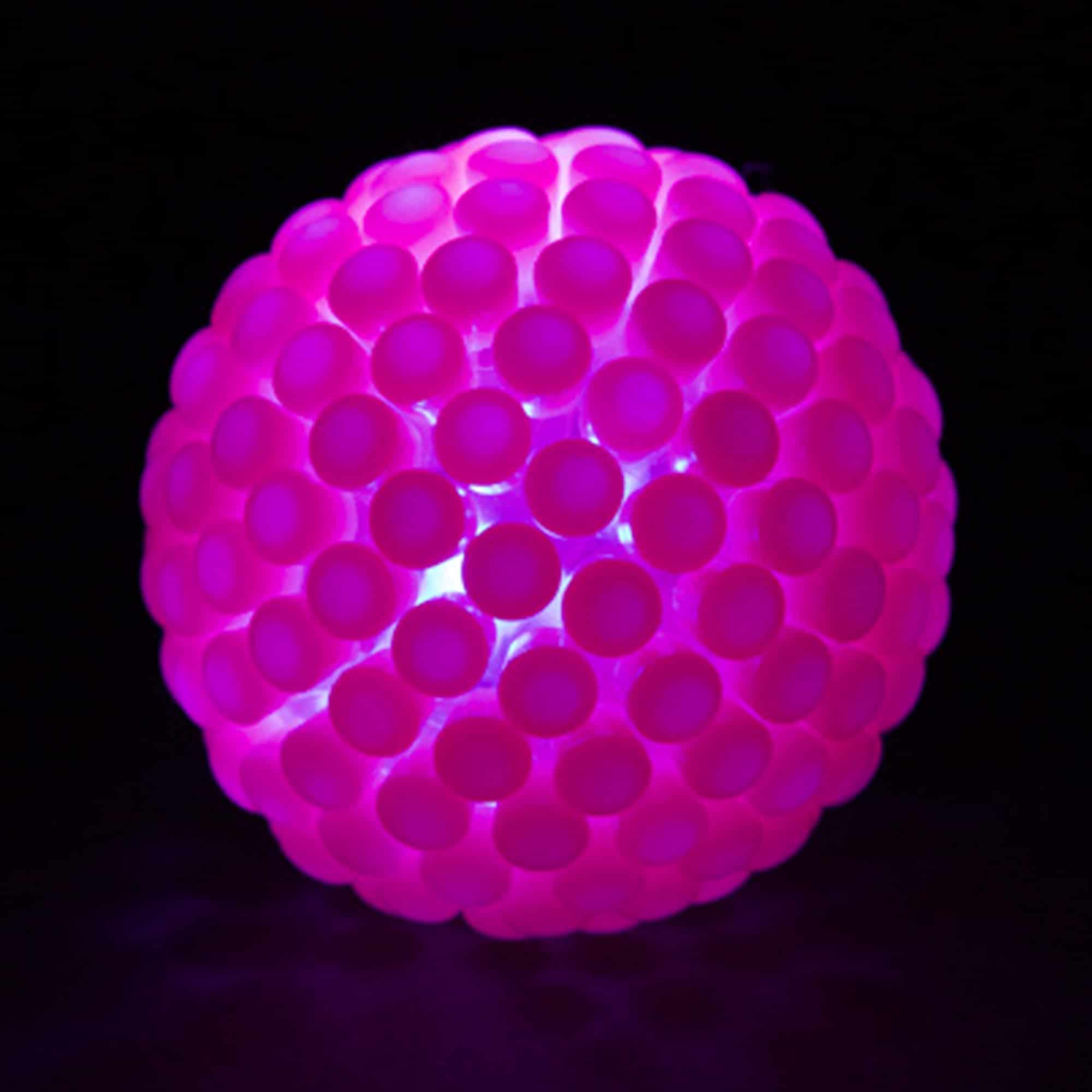Brite Ball with caps lighting up on impact