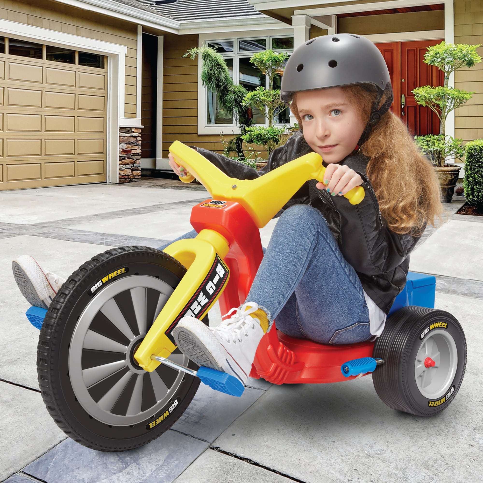 Big Wheel Big Spin 16 Inch - Lifestyle image of girl on Big Wheel